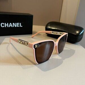 CHANEL Pink Oval Sunglasses with Gold Detail